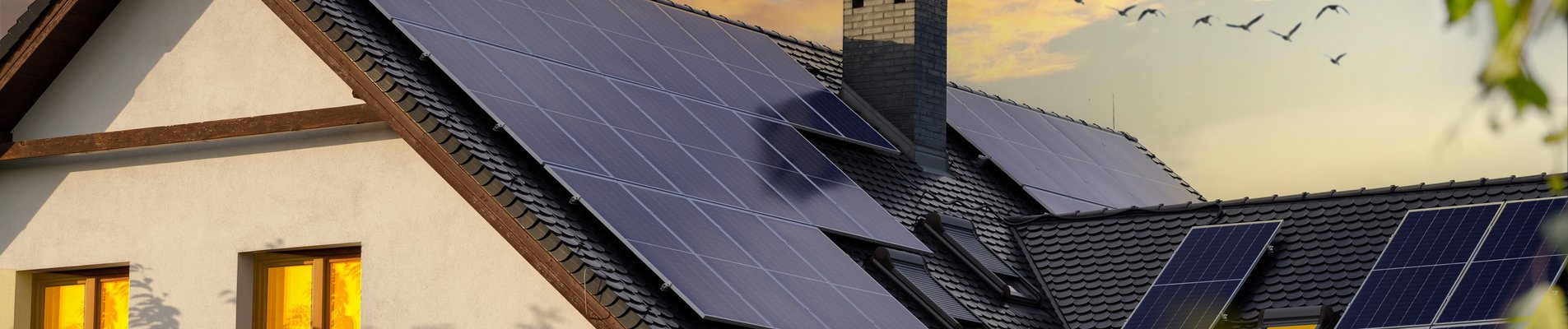 Modern house with solar panels. Night view of a beautiful white house with solar panels.